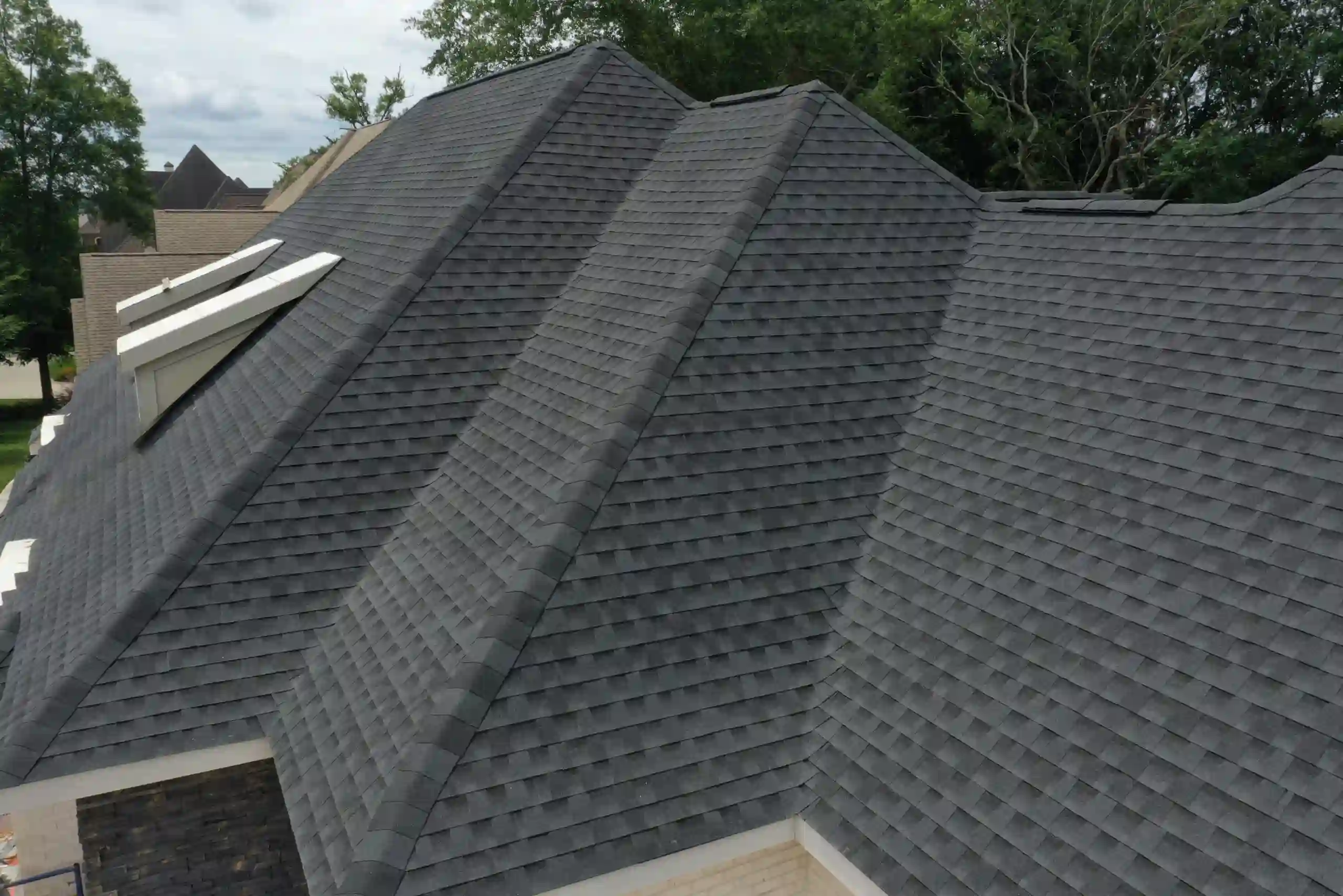 Multi-unit strata roofing and restoration project